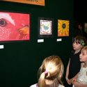Kids standing in front of school art
