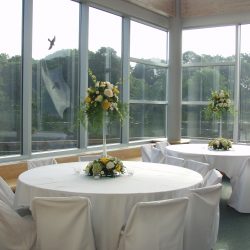 Banquet room with white wedding decor