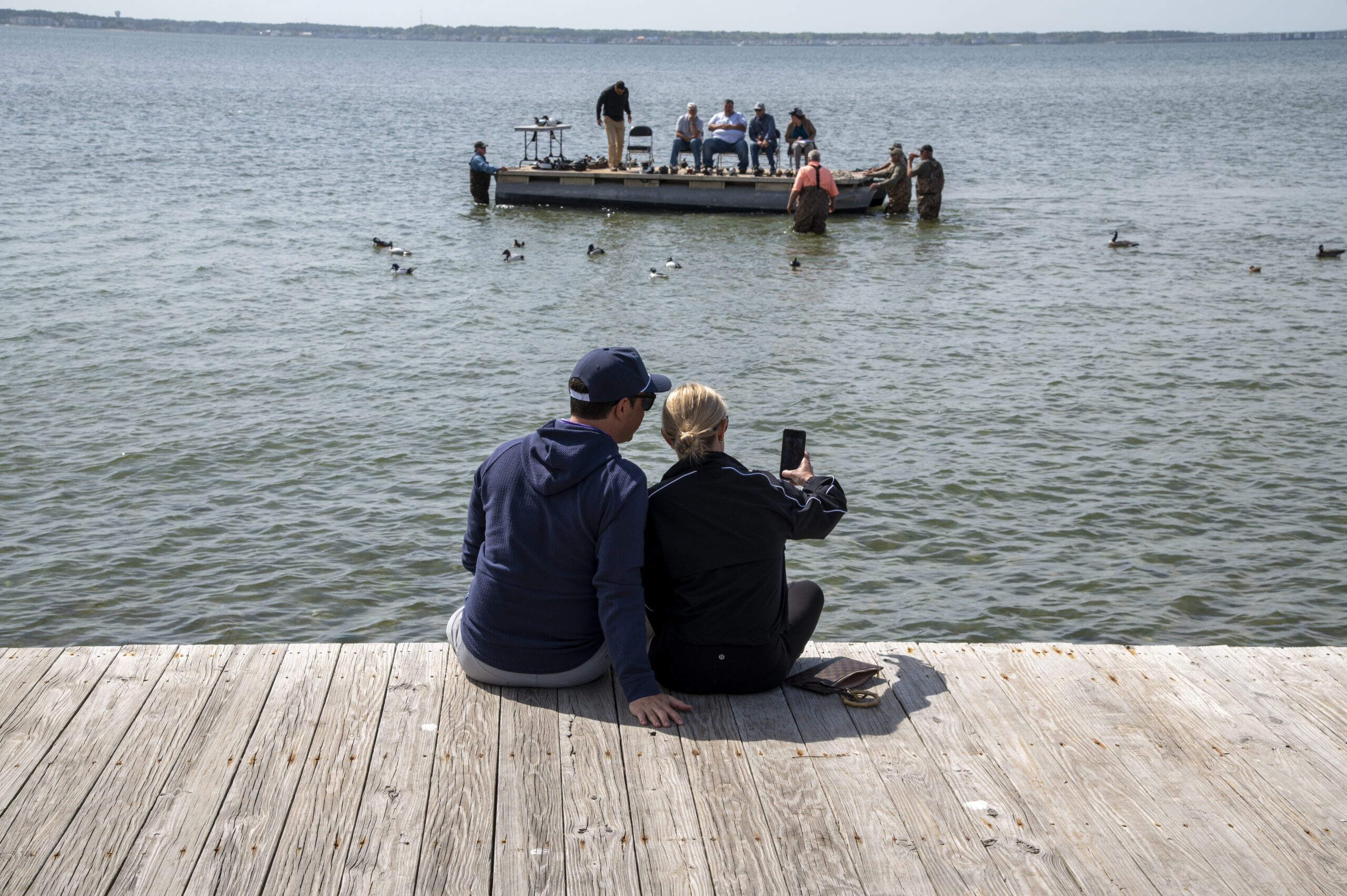 Watching judging on the bay at the 2025 Ward World Championship [Photo by Alan Wycheck]